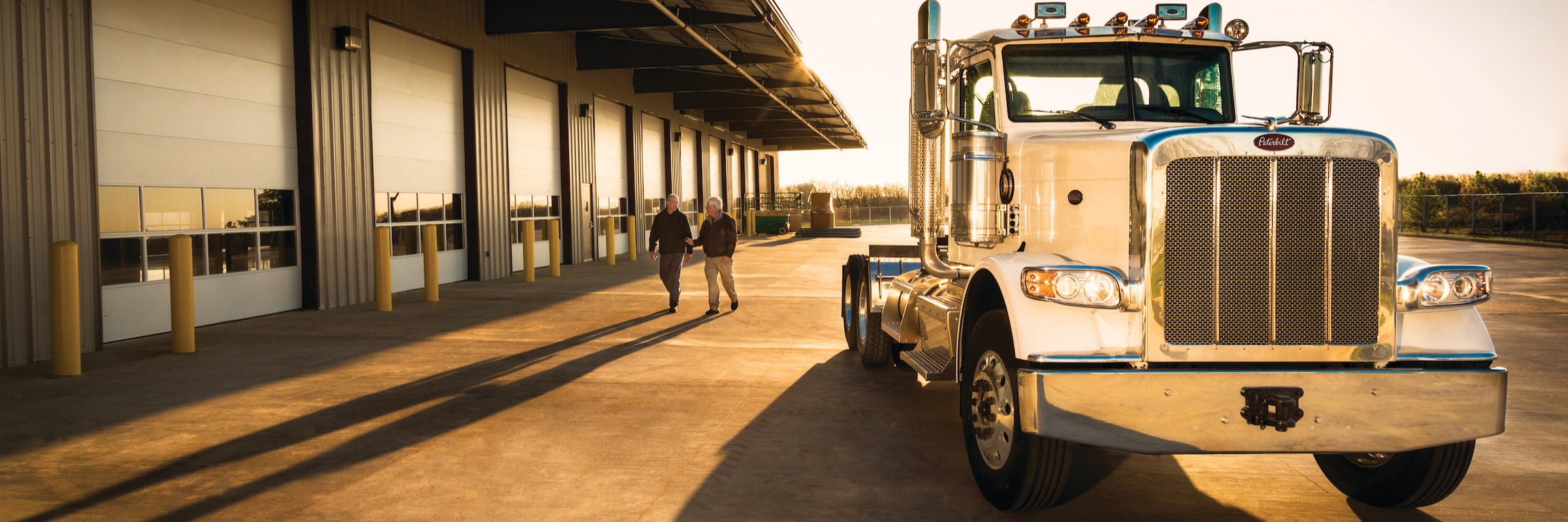 service bays with Peterbilt truck out front